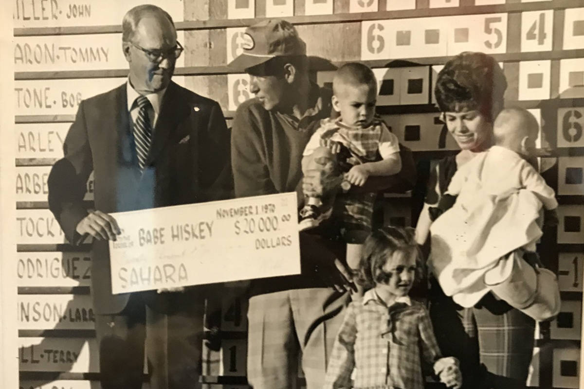 Del Webb presents Babe Hiskey with $20,000 for winning the 1970 Sahara Invitational. With Hiske ...