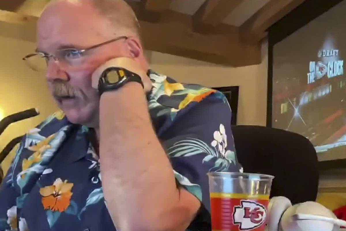In this still image from video provided by the NFL, Kansas City Chiefs head coach Andy Reid app ...