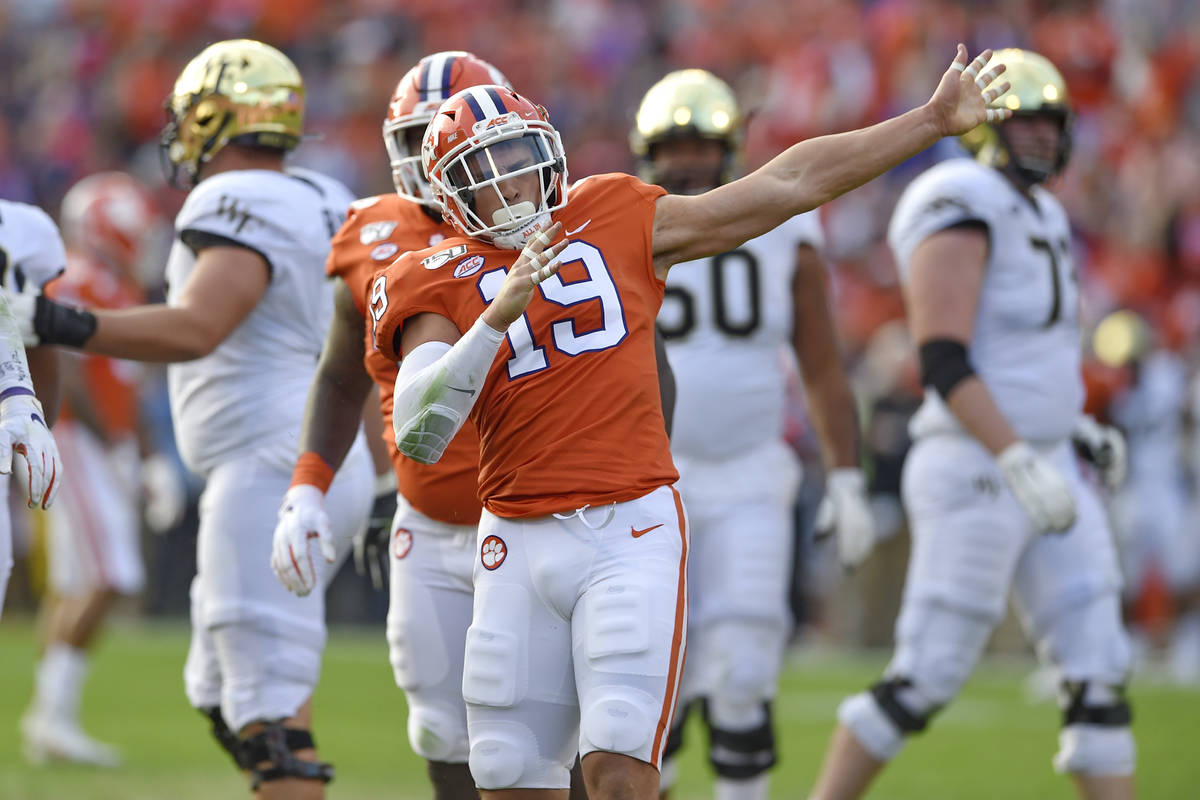 FILE - In this Nov. 16, 2019, file photo, Clemson's Tanner Muse reacts after sacking Wake Fores ...