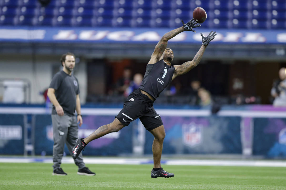 Ohio State defensive back Damon Arnette runs a drill at the NFL football scouting combine in In ...