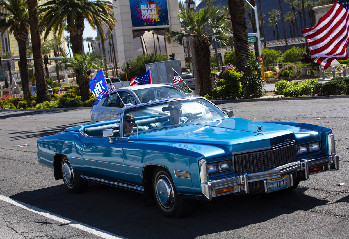 People participate in a "caravan" protest led by Wayne Allyn Root, not pictured, alon ...