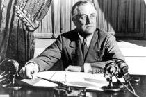 In this March 1933, file photo, President Franklin D. Roosevelt delivers his first radio "fires ...