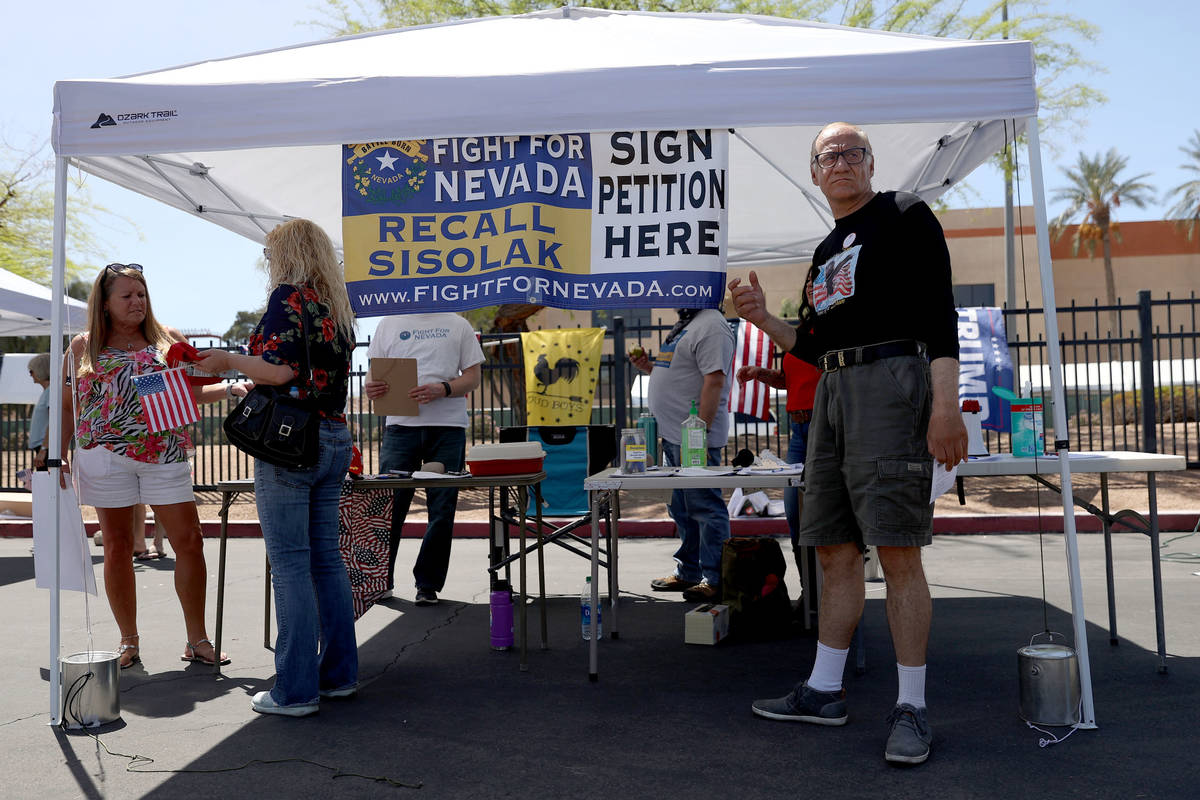 Bob Samuel of Las Vegas after signing a petition to recall Gov. Steve Sisolak during a Fight Fo ...