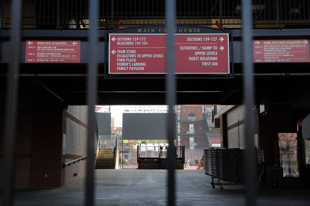 A concourse inside Busch Stadium, home of the St. Louis Cardinals baseball team, is seen throug ...