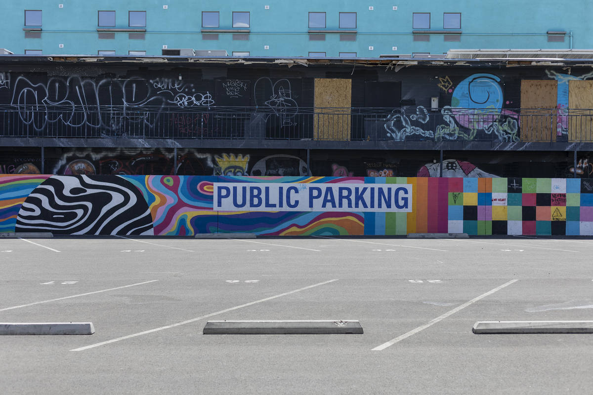 A downtown public parking lot sits empty in the midst of the coronavirus outbreak on Saturday, ...