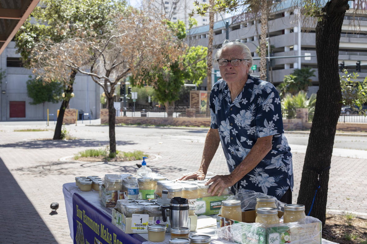John Jacobi sells raw honey at Downtown 3rd Farmers Market on Saturday, April 25, 2020, in Las ...
