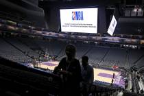 FILE - In this March 11, 2020 photo, fans leave the Golden 1 Center in Sacramento, Calif., aft ...