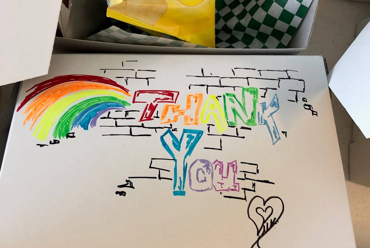 Beach Cafe's lunch boxes are delivered to health care workers with thank you notes from across ...