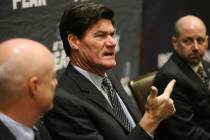 Mountain West Conference Commissioner Craig Thompson, center, speaks during the Mountain West b ...