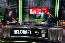In a photo provided by ESPN Images, Rece Davis, left, and Jesse Palmer discuss the NFL football ...