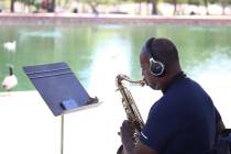Jose Kuykendall, a local hospital nurse, plays his saxophone during a sunny day at Sunset Park. ...