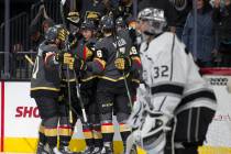 Los Angeles Kings goalie Jonathan Quick (32) looks on as the Vegas Golden Knights celebrate a g ...