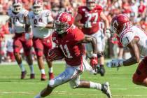 Alabama wide receiver Henry Ruggs III (11) runs free against New Mexico State during the first ...