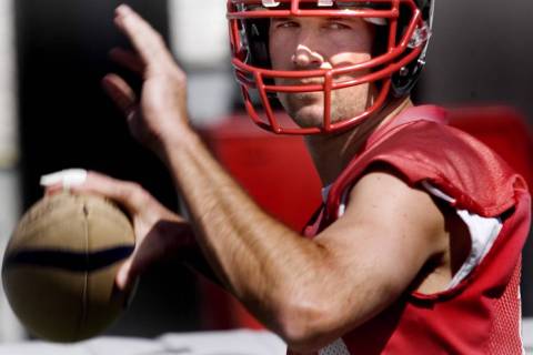 Sports; Gladiatiors quarterback, Clint Dolezel looks to throw a pass during practice at Sam Boy ...
