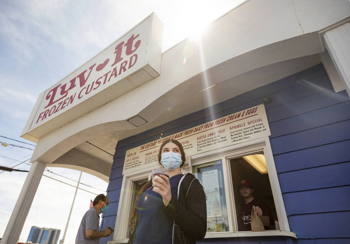 Healthworker Cameron Fleming of Las Vegas gets her to-go order from Luv-It Frozen Custard in La ...
