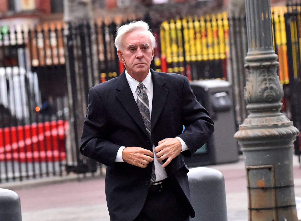 Bill Walters, professional gambler and owner of Walters Golf, enters court in New York on April ...