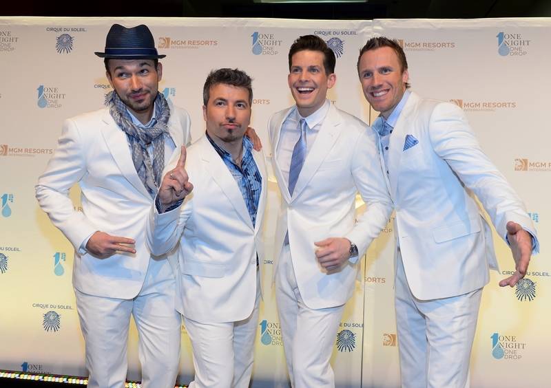The Tenors arrive on the blue carpet for Cirque du Soleil's "One Night for One Drop" at Mandala ...