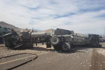 Troopers investigate a gravel truck rollover Wednesday, April 29, 2020, on southbound Interstat ...