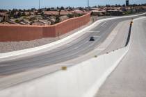 A single car drives on I-215 north near Lone Mountain Road on Saturday, April 4, 2020, in Las V ...