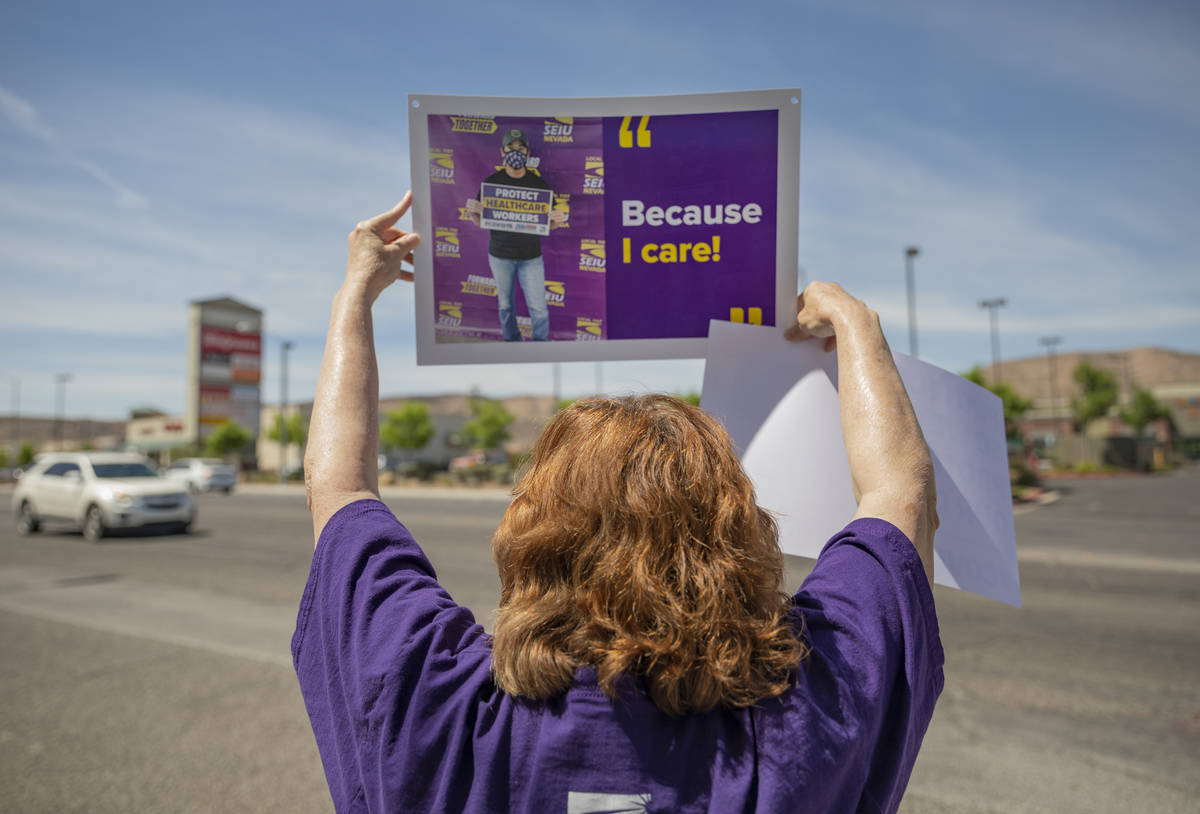 A Local SEIU 1107 member honors other frontline health care workers and list demands for more p ...