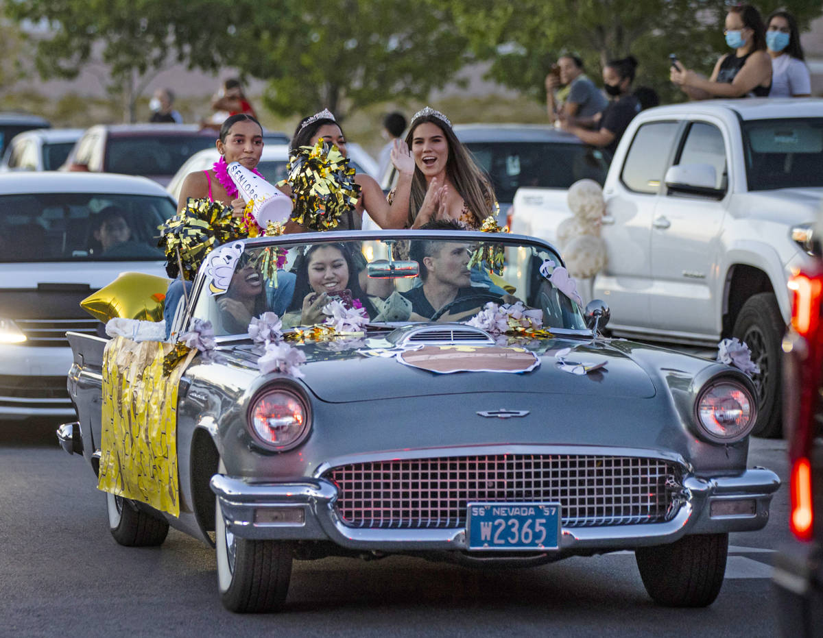 Desert Oasis High School students participate in a senior prom parade in Las Vegas on Friday, M ...