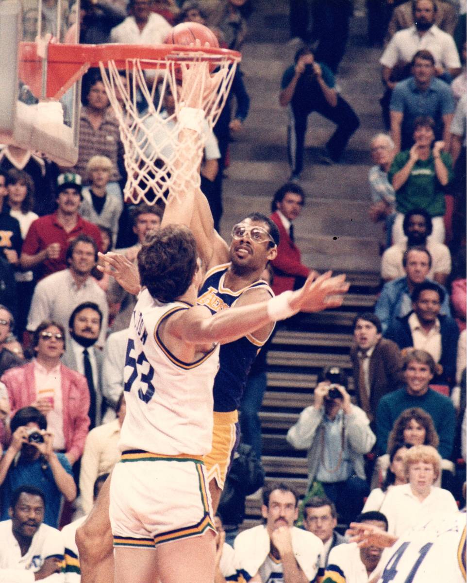 Kareem Abdul-Jabbar of the Los Angeles Lakers releases a 12-foot sky-hook over Utah Jazz center ...