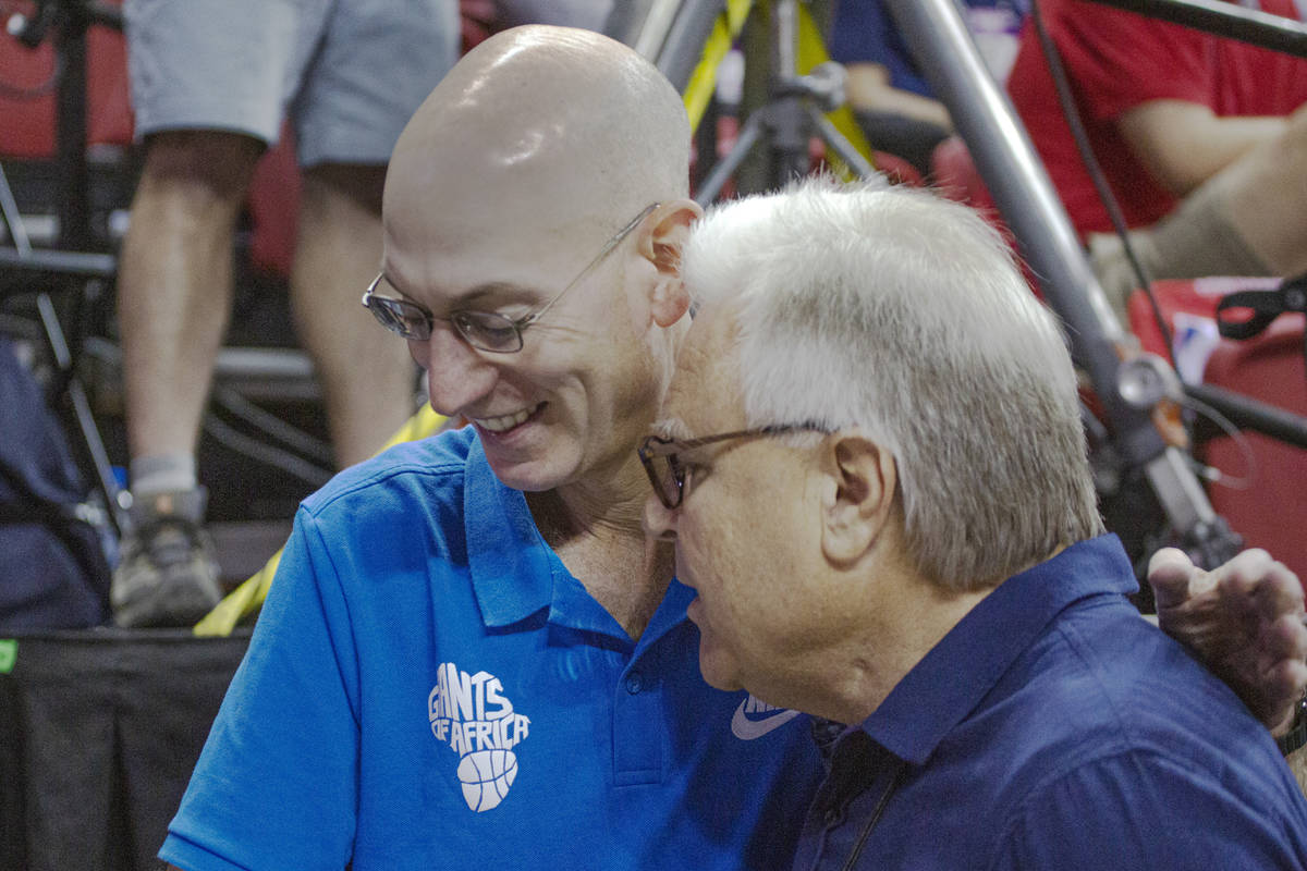 NBA Commissioner Adam Silver talks to Summer League Executive director Warren LeGarie during th ...