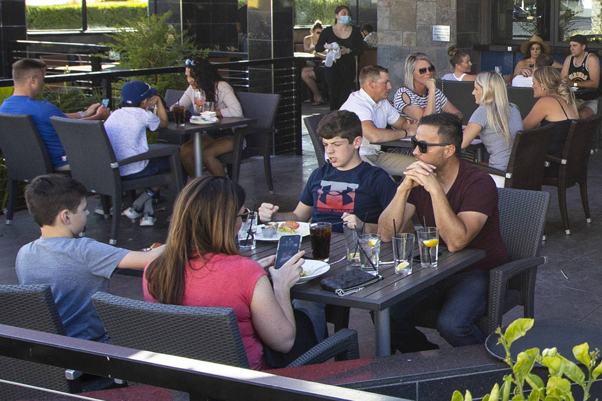 People dine at Kona Grill in Boca Park as some restaurants open for table-service in Las Vegas ...
