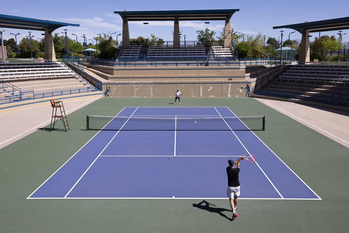 Kevin Janison plays tennis with JF Blais at Darling Tennis Center on Friday, May 1, 2020, in La ...