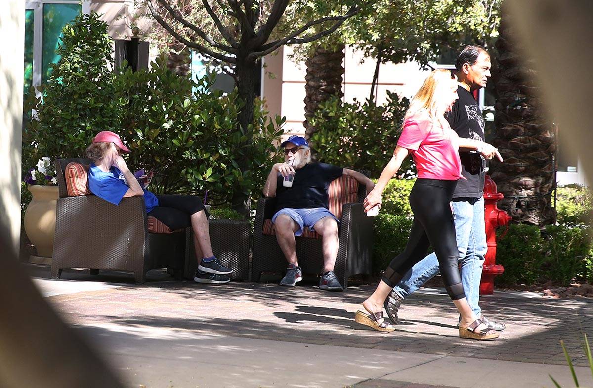 Suzi Banto and her husband Bobby, both of Henderson, relax at The District on Friday, May 1, 20 ...