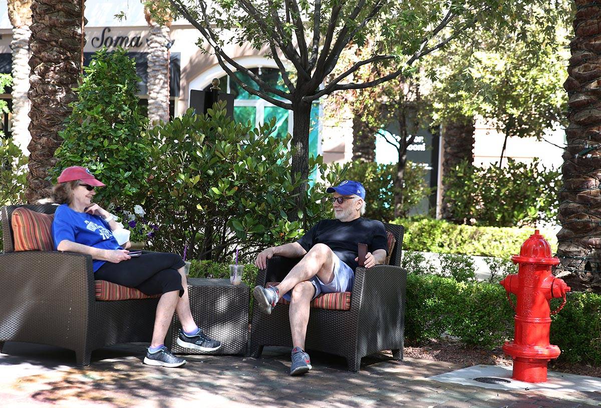Suzi Banto and her husband Bobby, both of Henderson, relax at The District on Friday, May 1, 20 ...