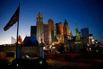 The sun sets along the Las Vegas Strip devoid of the usual crowds and traffic after casinos and ...