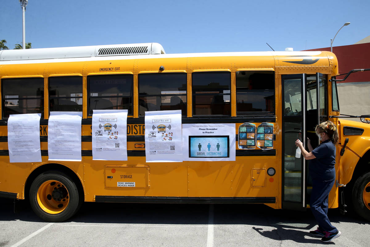 Clark County School District bus driver Marie Grootonk brings a WiFi school bus for students on ...
