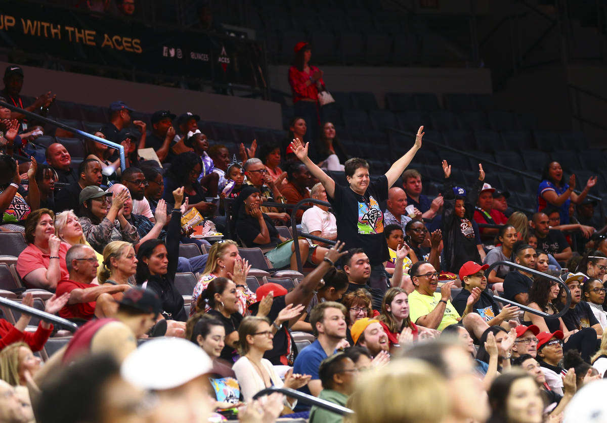 Las Vegas Aces fans cheer during the first half of a WNBA basketball game against the Washingto ...