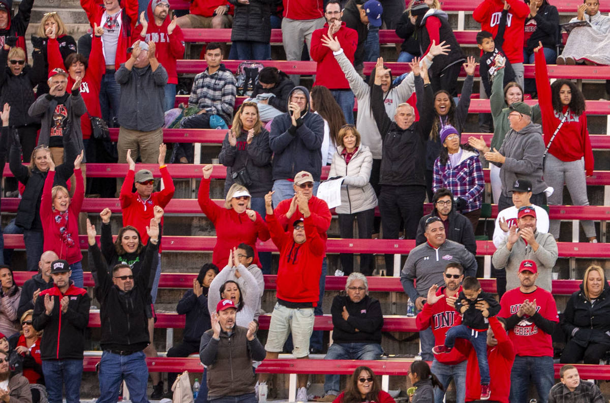 UNLV fans celebrate a go-ahead touchdown late versus the San Jose State Spartans during the fou ...