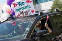 Vehicles drive through to thank Southwest Medical physicians and nurses for their frontline wor ...