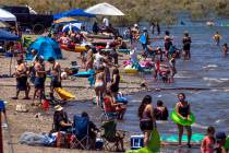 Visitors practice little social distancing at Boulder Beach in the Lake Mead National Recreatio ...