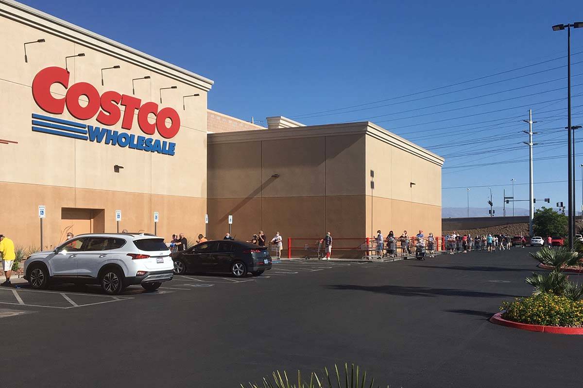 Shoppers were lined up as early as 6:30 a.m. for a special shopping hour at Costco in Henderson ...