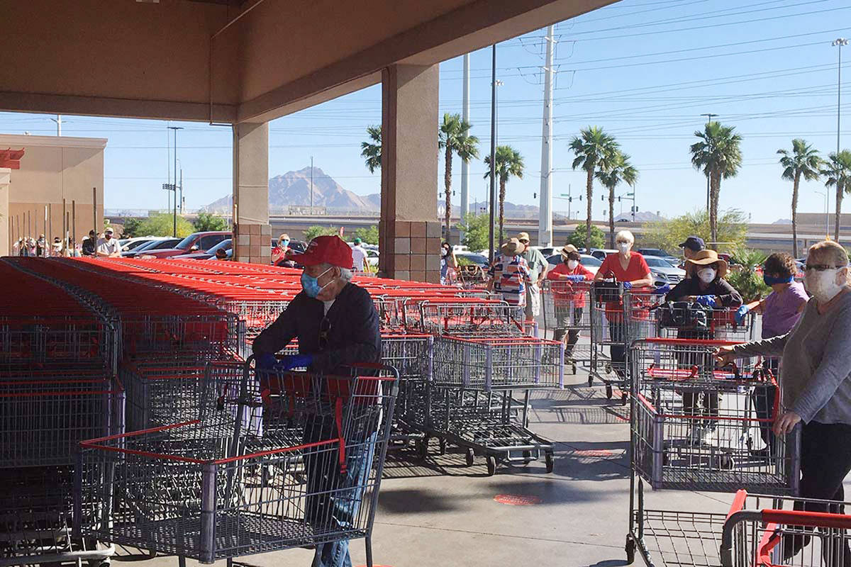 Seniors line up for special shopping hour at Costco in Henderson, May 4, 2020. (Michael Quine/L ...