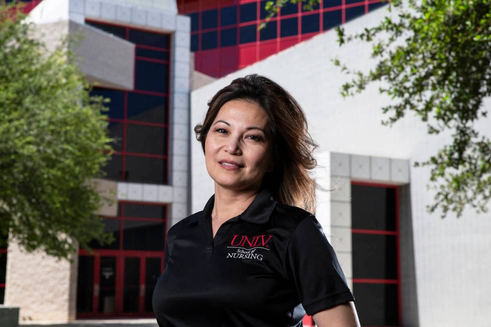 Alona Angosta is associate professor and director of the master of science in nursing program a ...