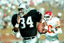 Bo Jackson, the two-sport star and running back for the Los Angeles Raiders, takes off on a 45- ...