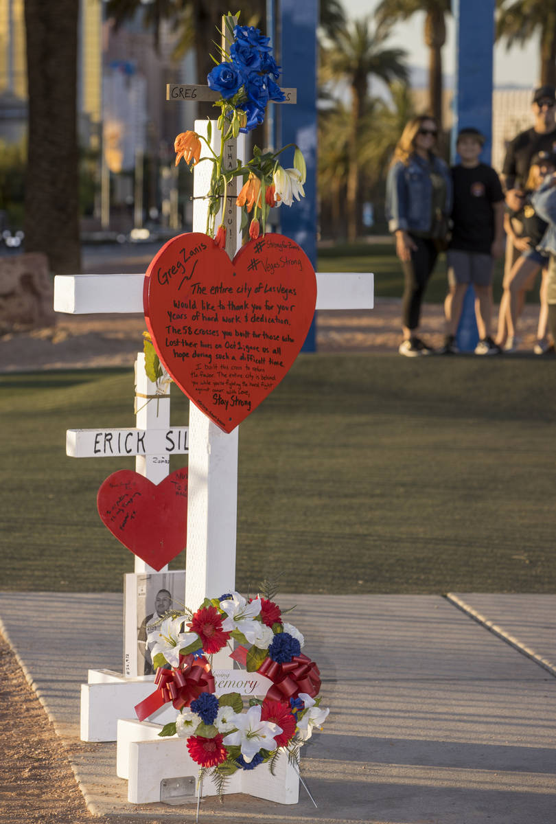 White crosses for Greg Zanis at the "Welcome to Fabulous Las Vegas" sign on Monday, M ...