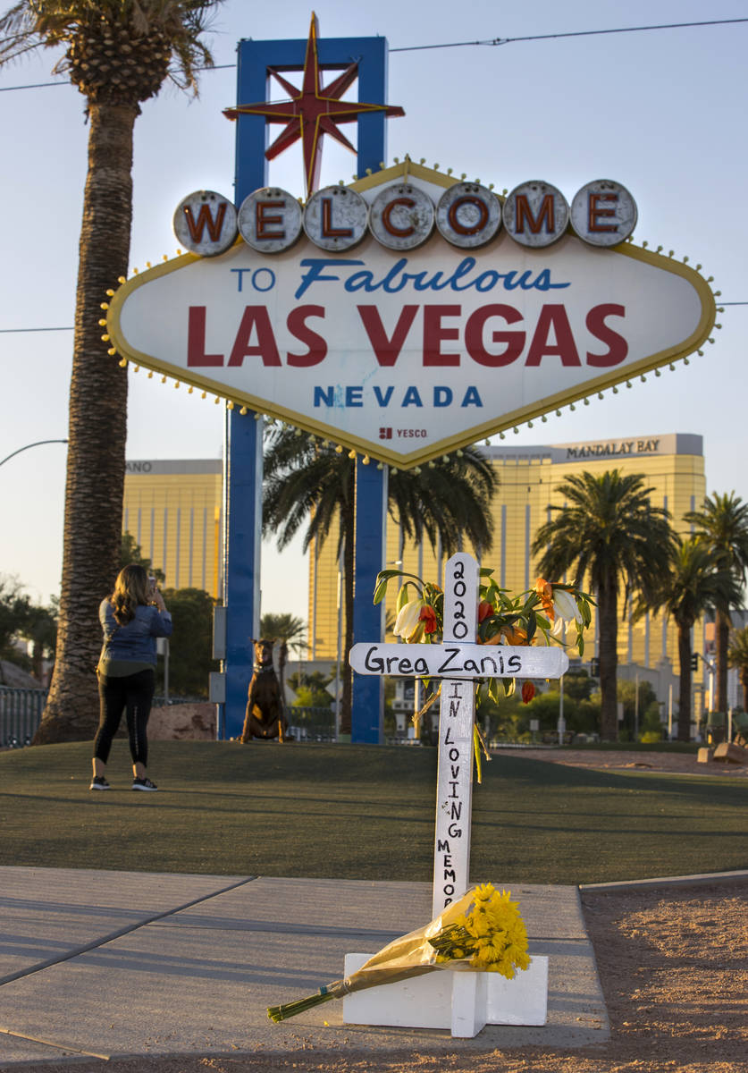 White crosses for Greg Zanis at the "Welcome to Fabulous Las Vegas" sign on Monday, M ...