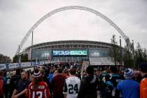 In this Oct. 26, 2014, file photo, sans arrive at Wembley Stadium before an NFL football game b ...
