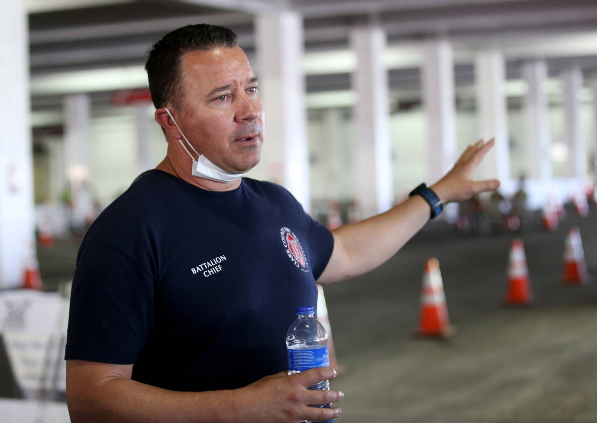 Clark County Fire Battalion Chief Rian Glassford talks to the news media during a preview of a ...