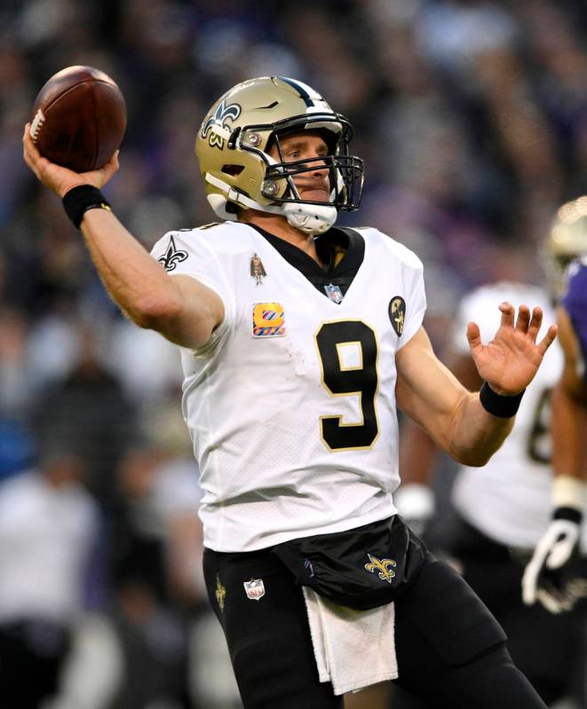 FILE - In this Oct. 21, 2018, file photo, New Orleans Saints quarterback Drew Brees (9) prepare ...