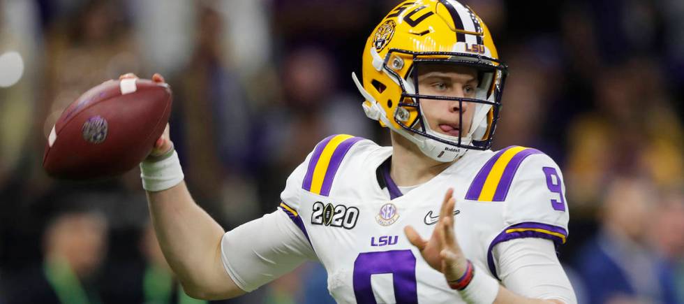 FILE - In this Jan. 13, 2020, file photo, LSU quarterback Joe Burrow throws a pass against Clem ...