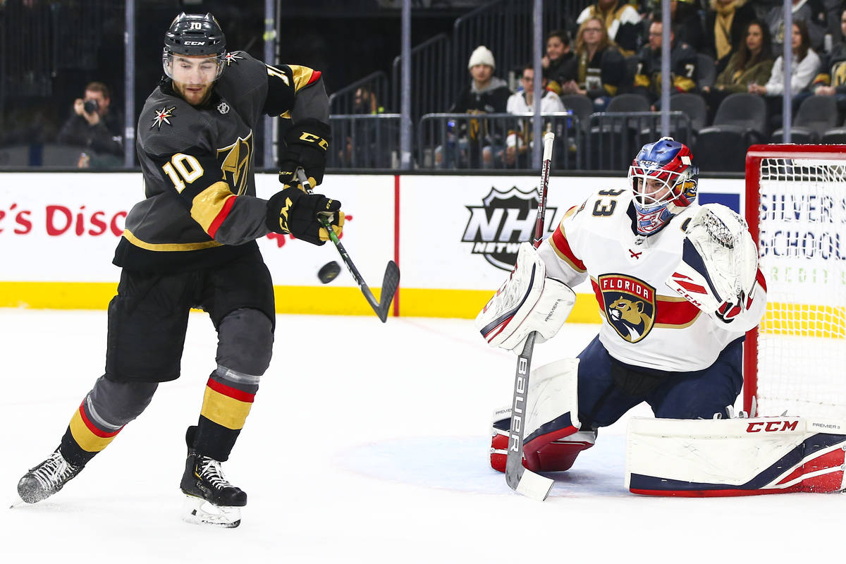 Golden Knights' Nicolas Roy (10) tries to redirect a shot against Florida Panthers goaltender S ...