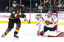 Golden Knights' Nicolas Roy (10) tries to redirect a shot against Florida Panthers goaltender S ...