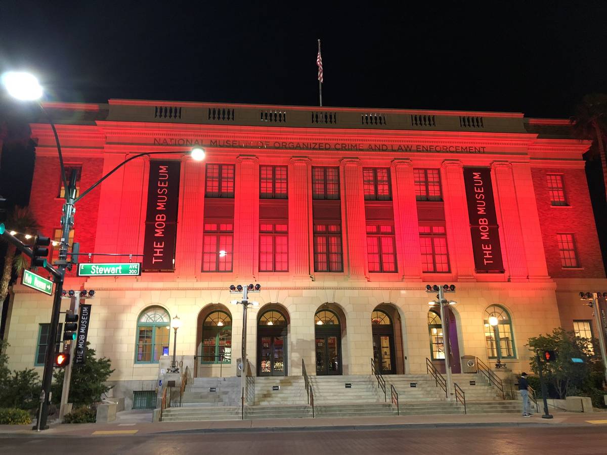 The Mob Museum is lighted up in red on Tuesday, May 5, 2020, in honor of National Travel and To ...